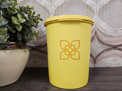 Tupperware voorraadbus geel met sterdeksel – Ø 11,5 cm x 15,5