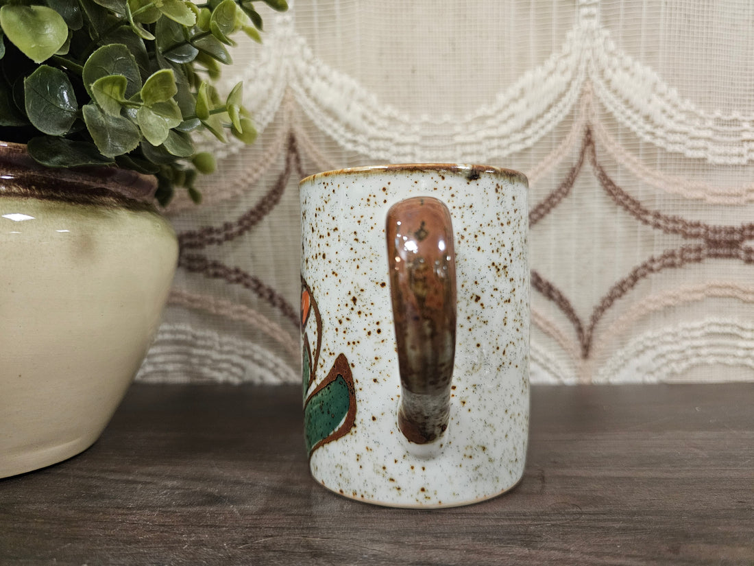 Vintage mok gespikkeld oranje bloemmotief 9,5 cm