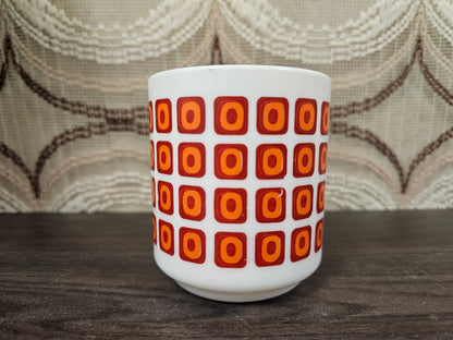 Vintage Arcopal mok oranje – geometrisch patroon