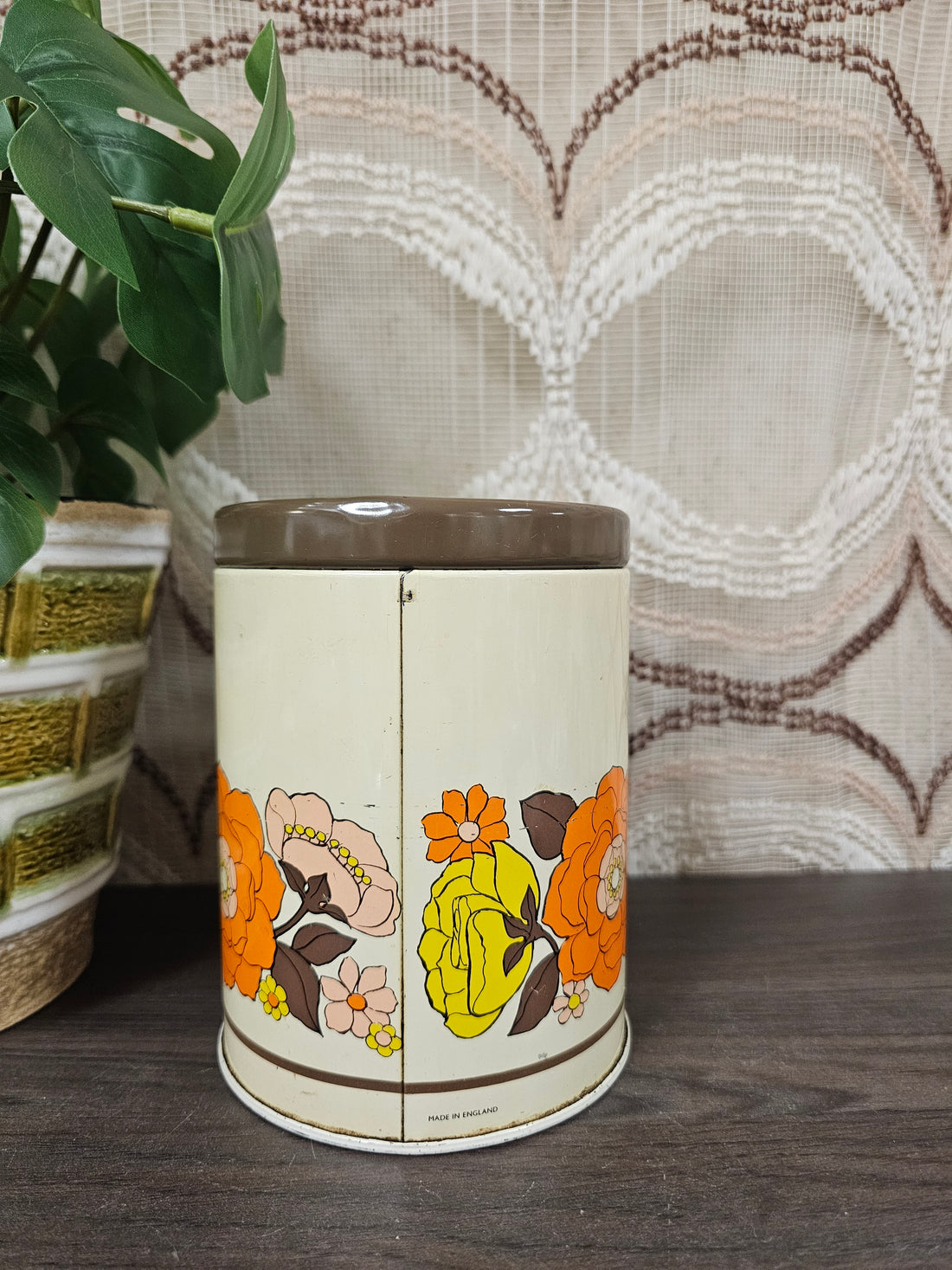 Vintage blik met bloemendecor