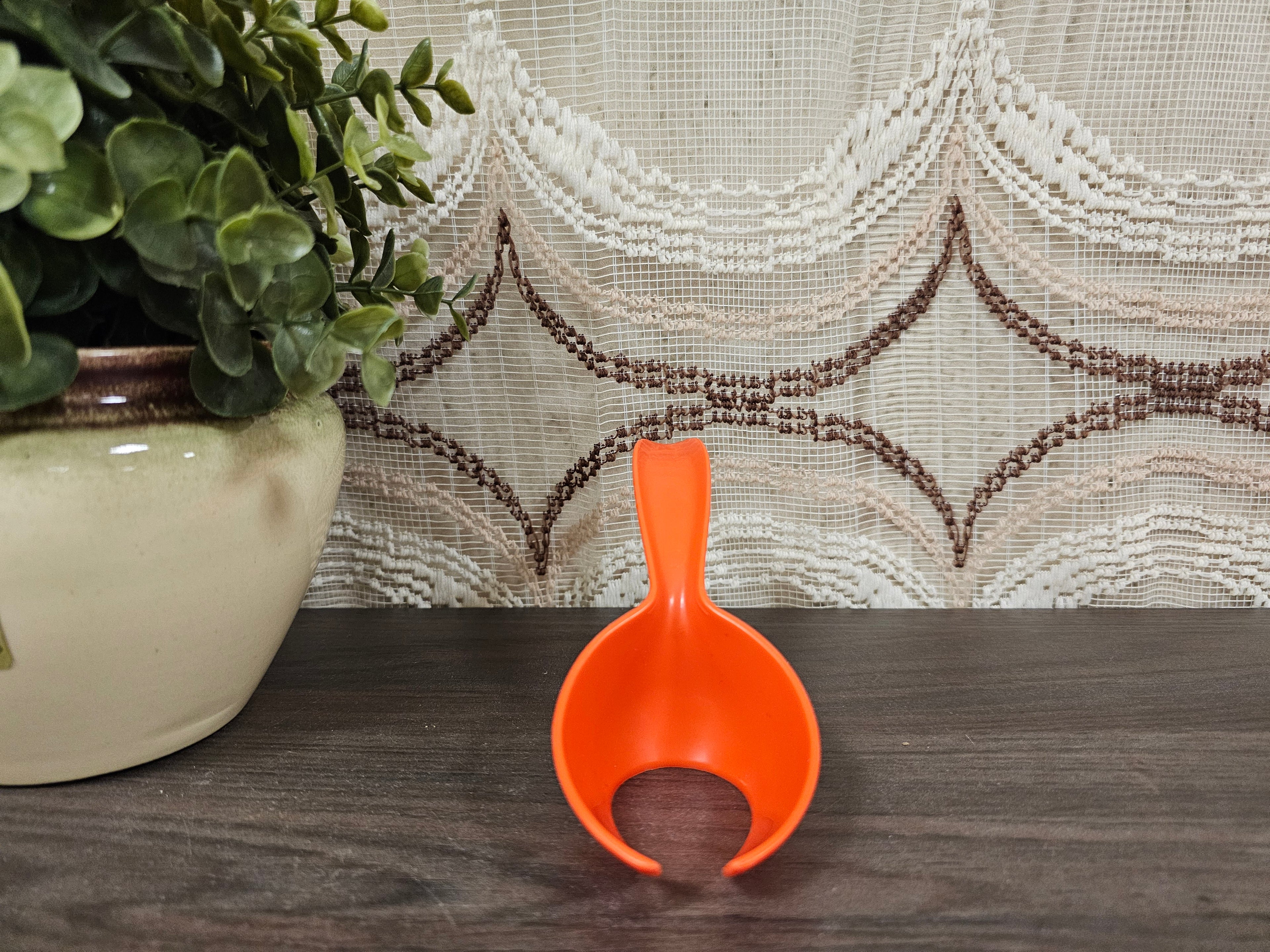 Tupperware eierlepel oranje vintage kunststof lepel