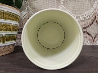 Vintage thee blik met bloemen