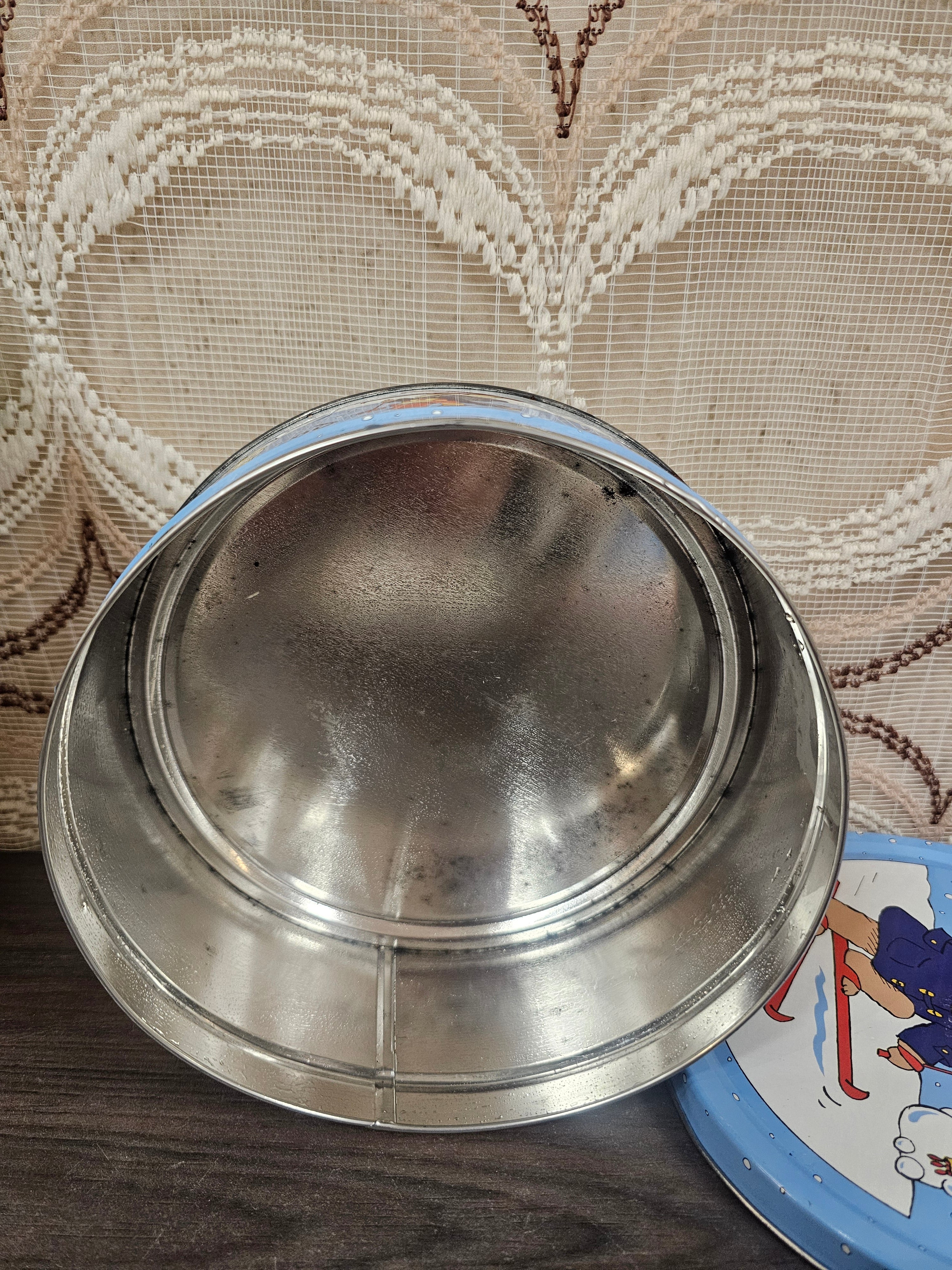 Paddington Bear koekblik winter ski’s