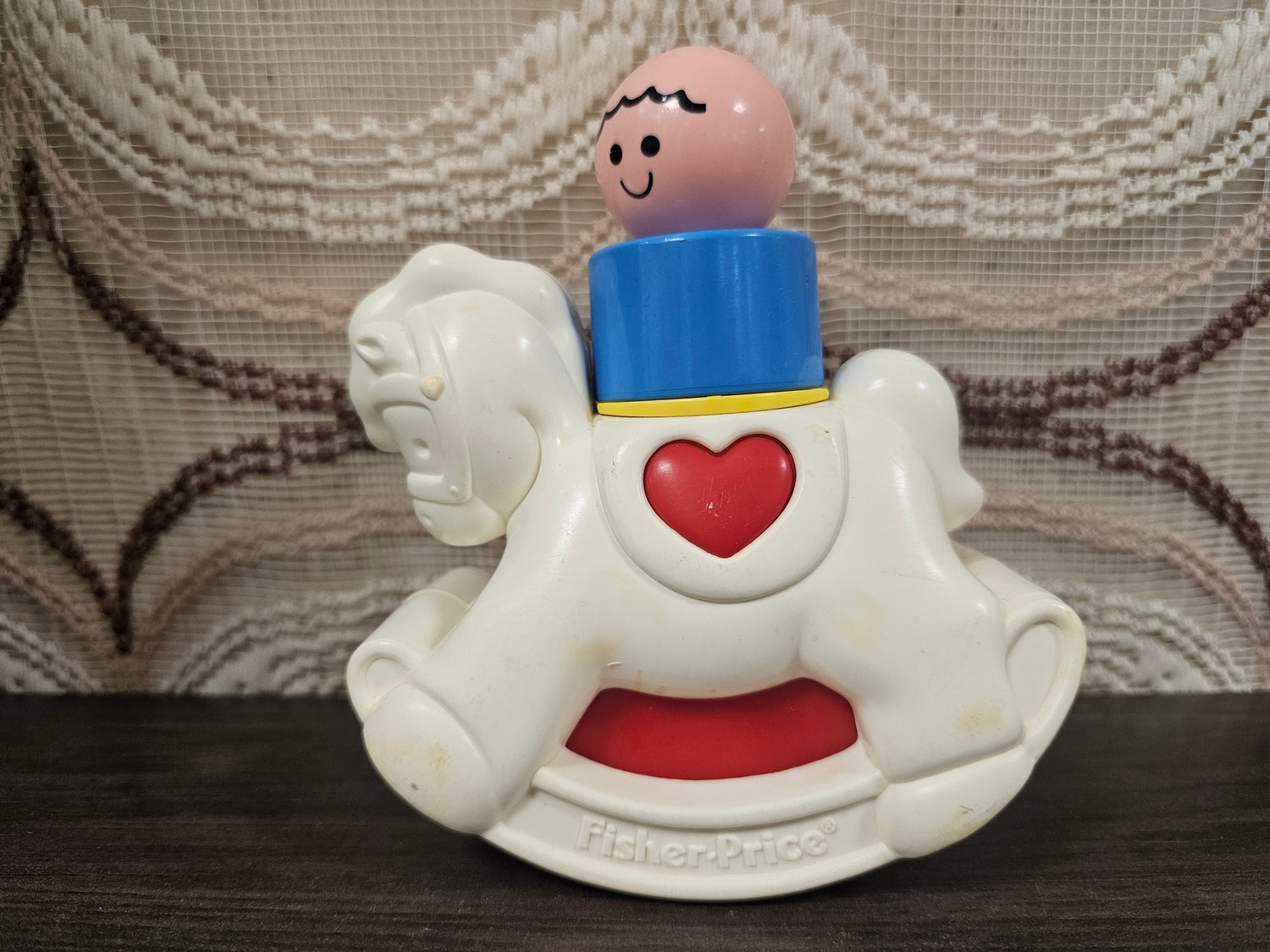 Vintage Fisher-Price hobbelpaard met poppetje