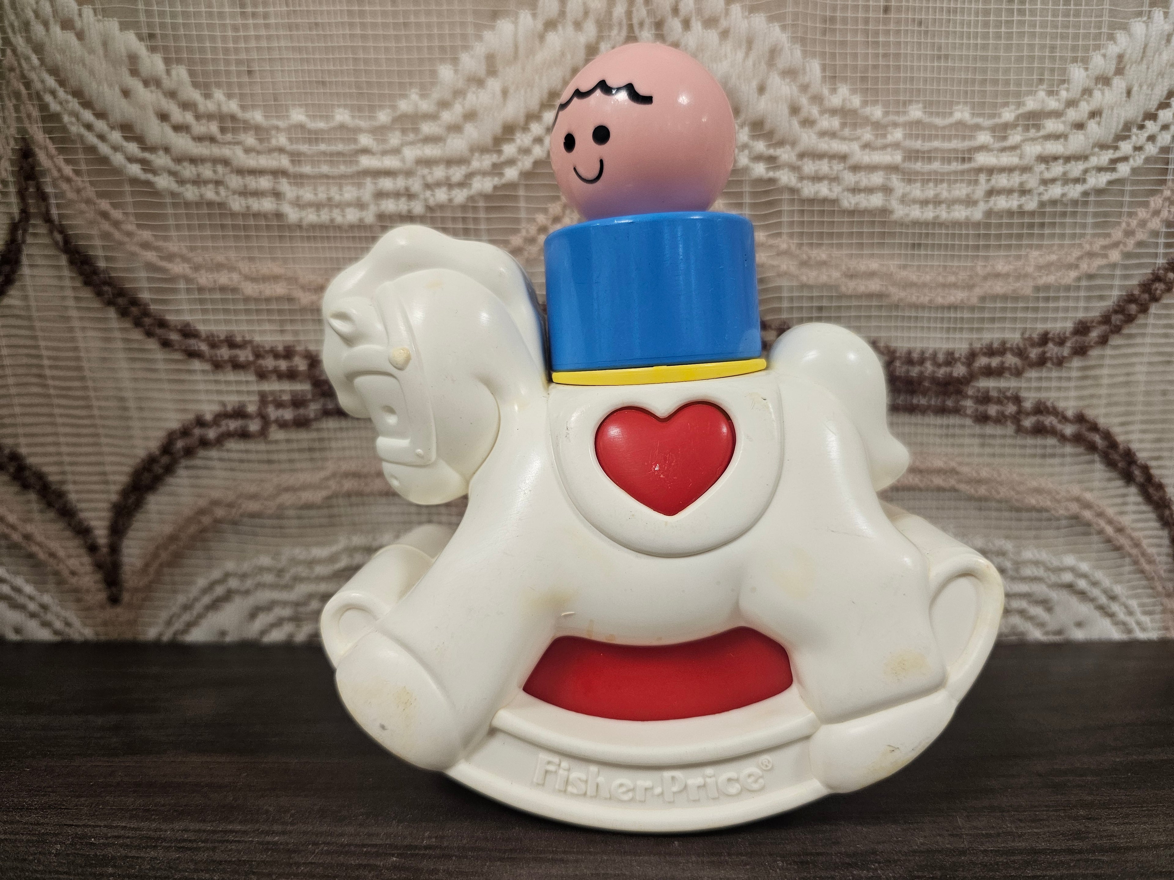 Vintage Fisher-Price hobbelpaard met poppetje