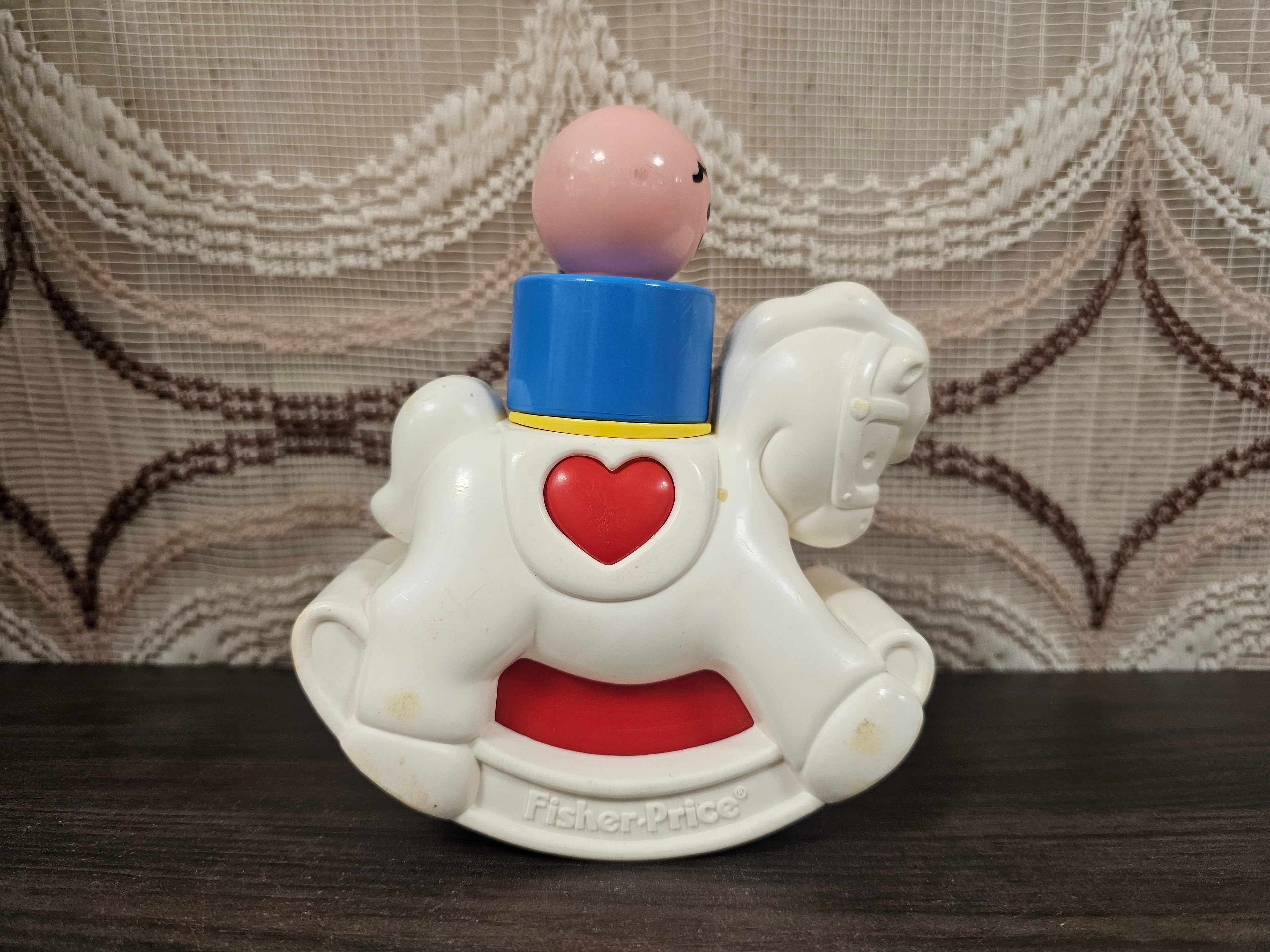 Vintage Fisher-Price hobbelpaard met poppetje
