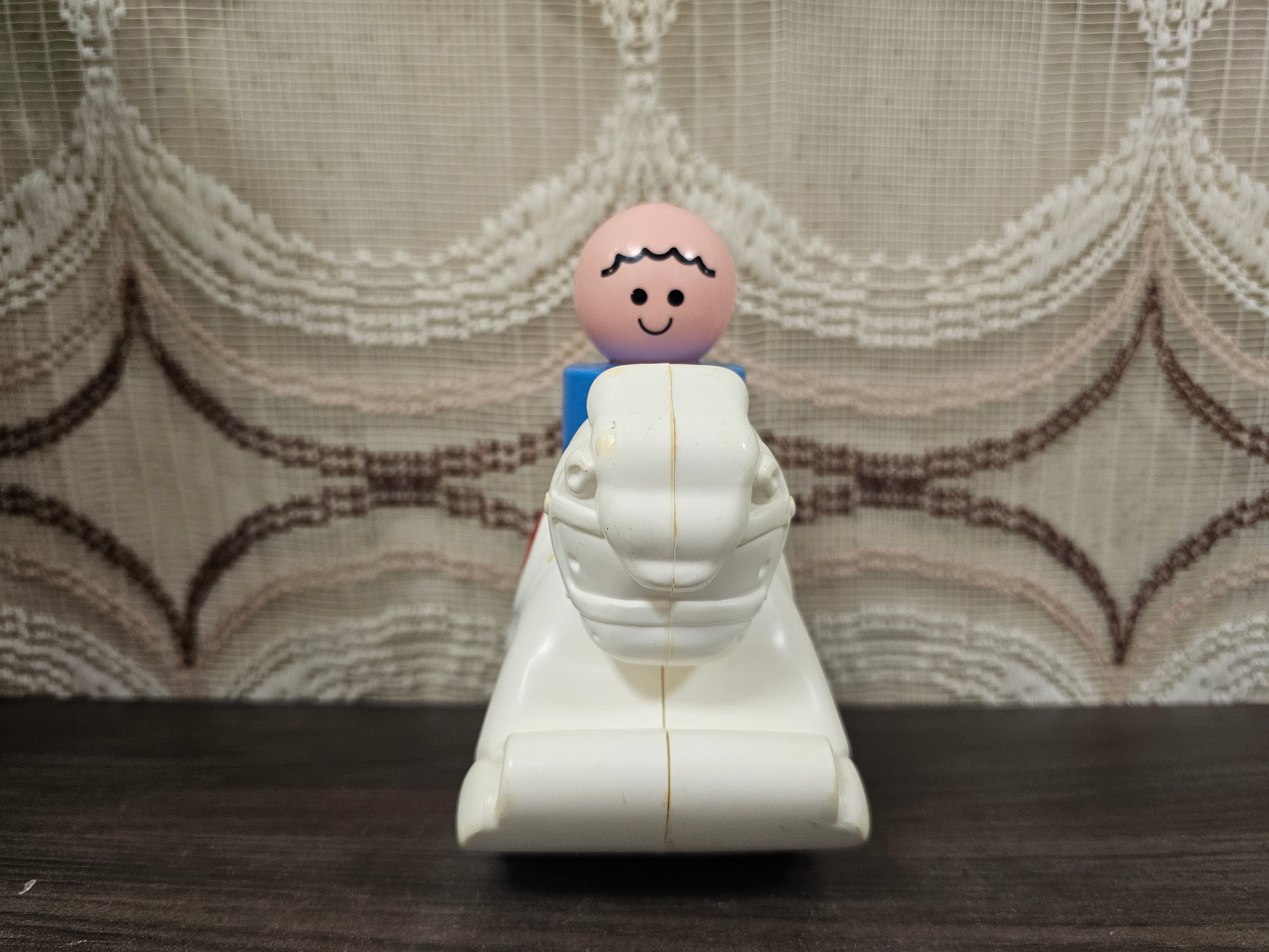 Vintage Fisher-Price hobbelpaard met poppetje