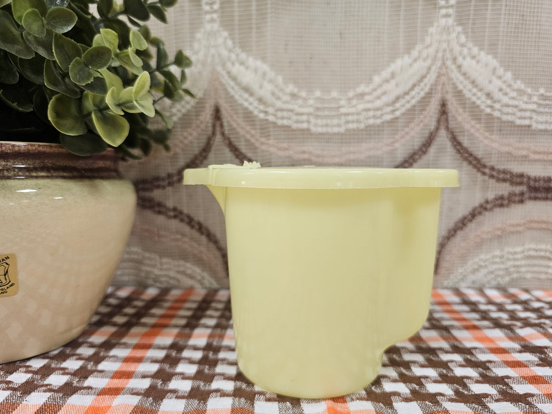 Vintage Tupperware kannetje zachtgeel