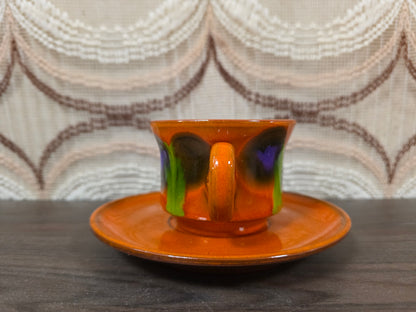 Vintage kop en schotel oranje met paars groen fat lava