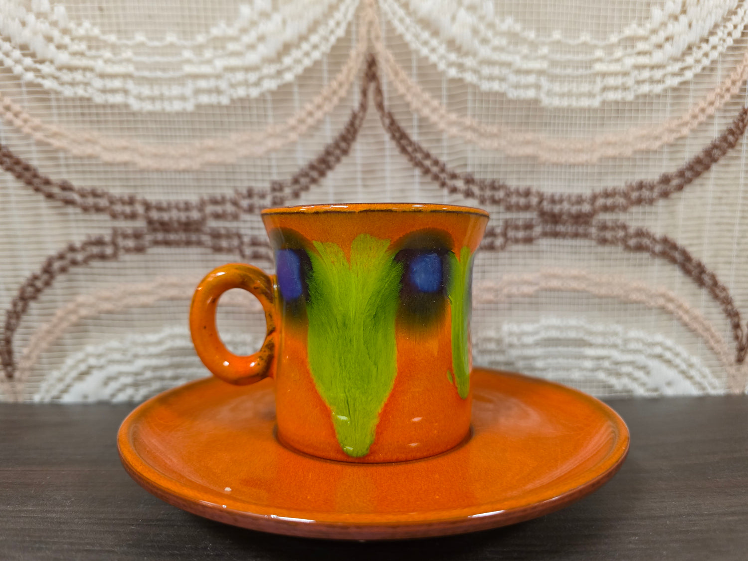 Kop en schotel oranje fat lava paars groen