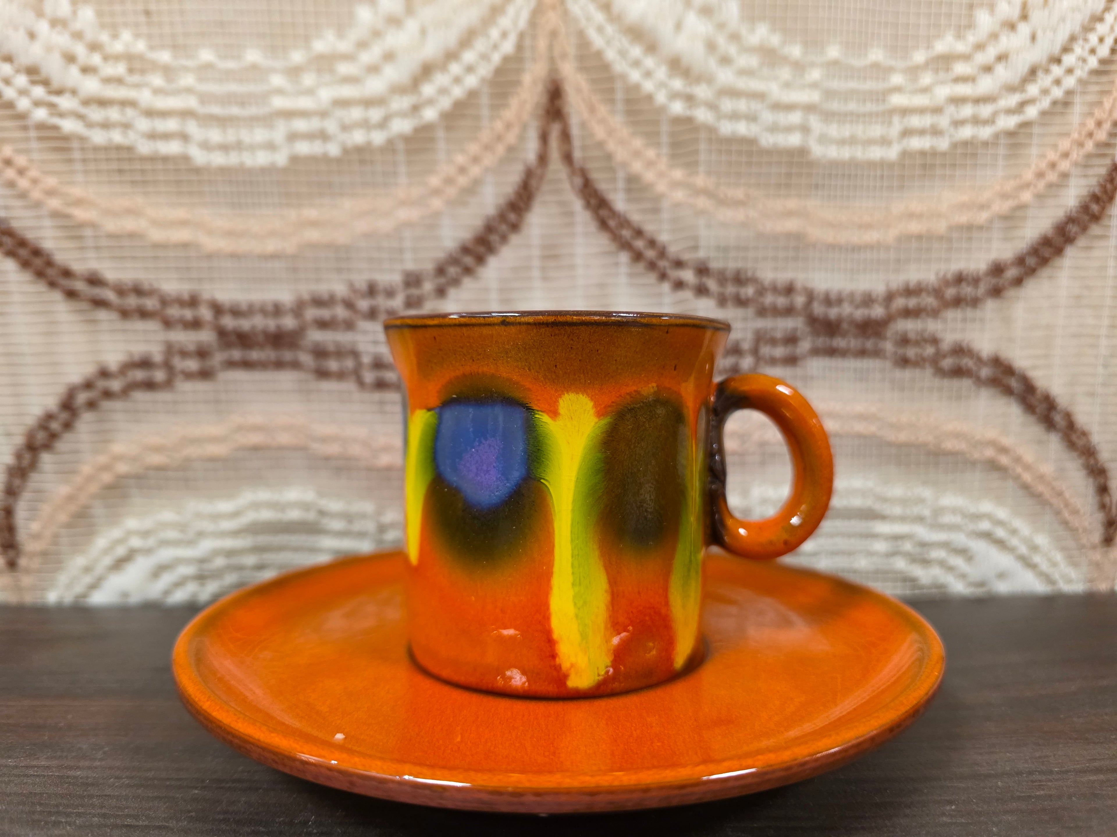 Kop en schotel oranje fat lava paars geel