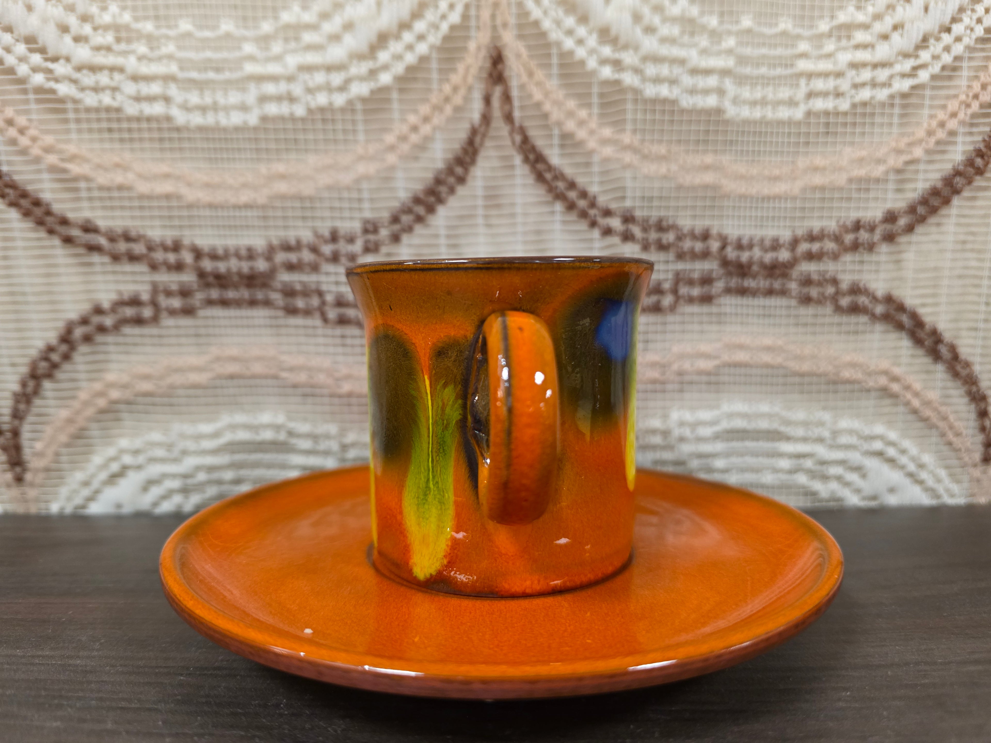 Kop en schotel oranje fat lava paars geel