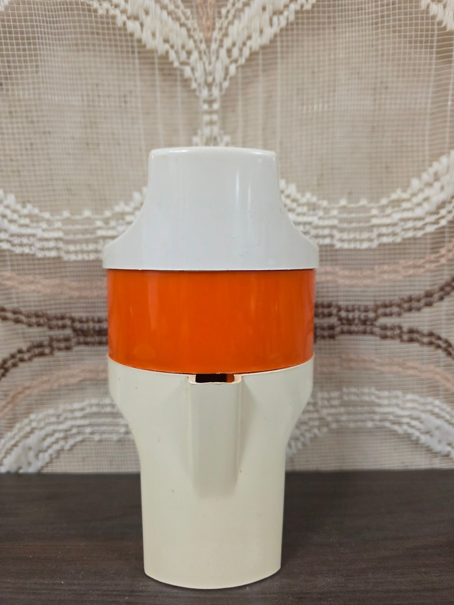 Vintage citruspers oranje wit kunststof
