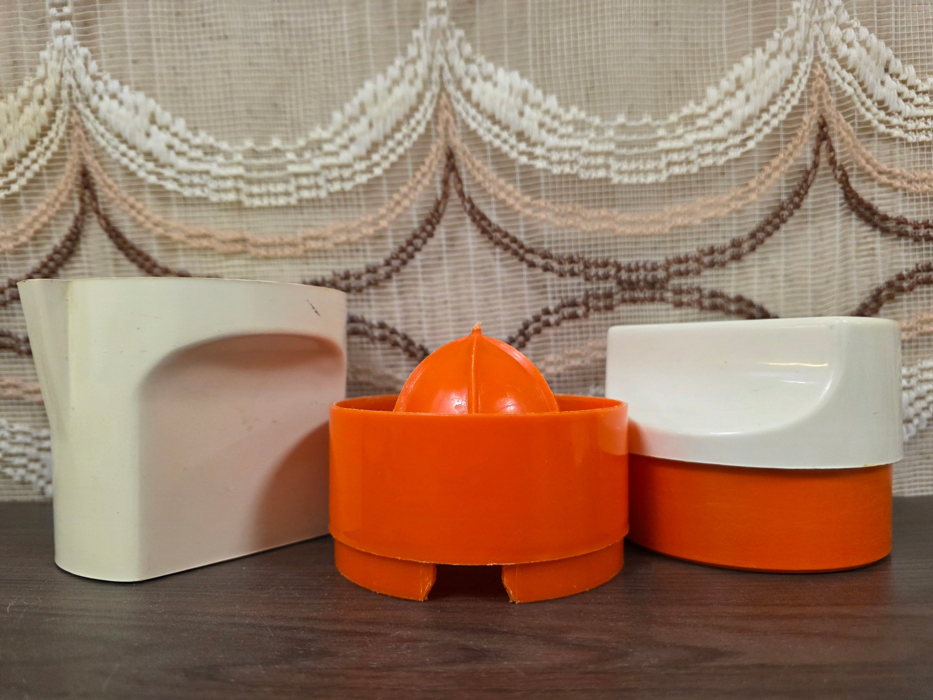Vintage citruspers oranje wit kunststof