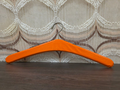 Vintage kledinghanger oranje skaileder met studs jaren 70