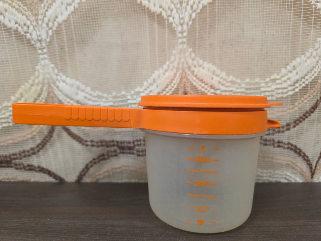 Vintage Tupperware bloemzeef handzeef oranje