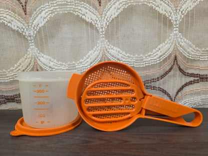 Vintage Tupperware bloemzeef handzeef oranje