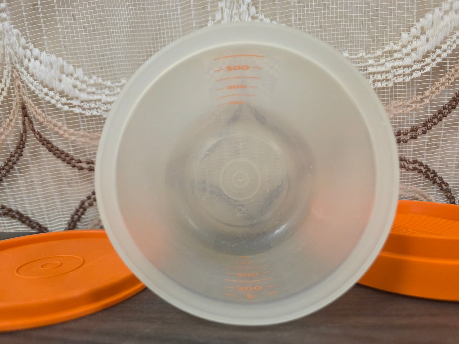 Vintage Tupperware bloemzeef handzeef oranje