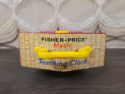 Fisher Price music box teaching clock