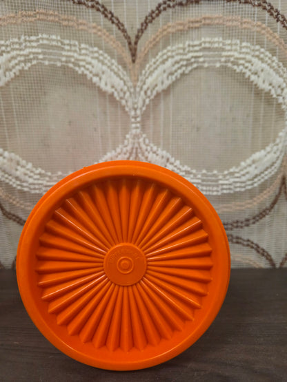 Tupperware oranje voorraadbus sterdeksel