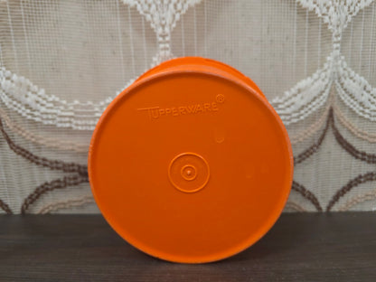 Tupperware oranje voorraadbus met bloemmotief 9 x 14