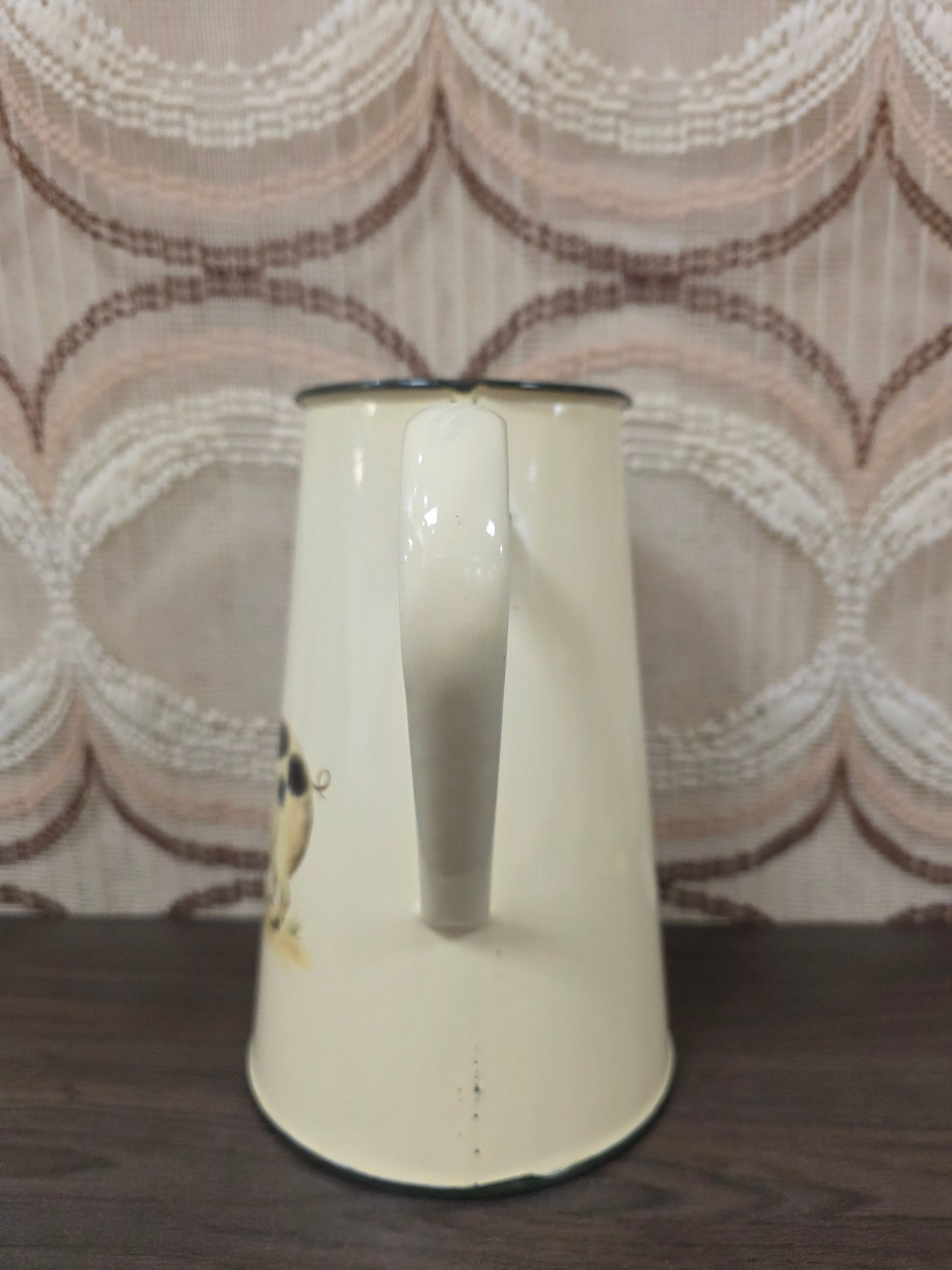 Vintage emaille schenkkan met varken