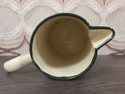 Vintage emaille schenkkan met varken