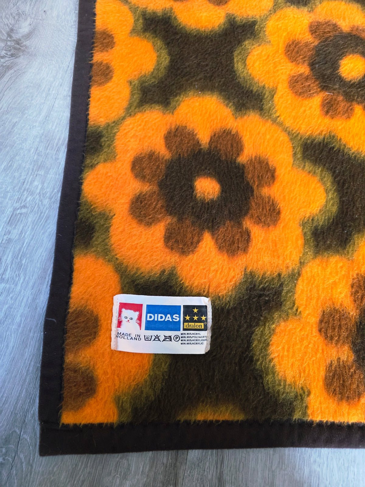 Didas deken oranje bruin groen bloemen