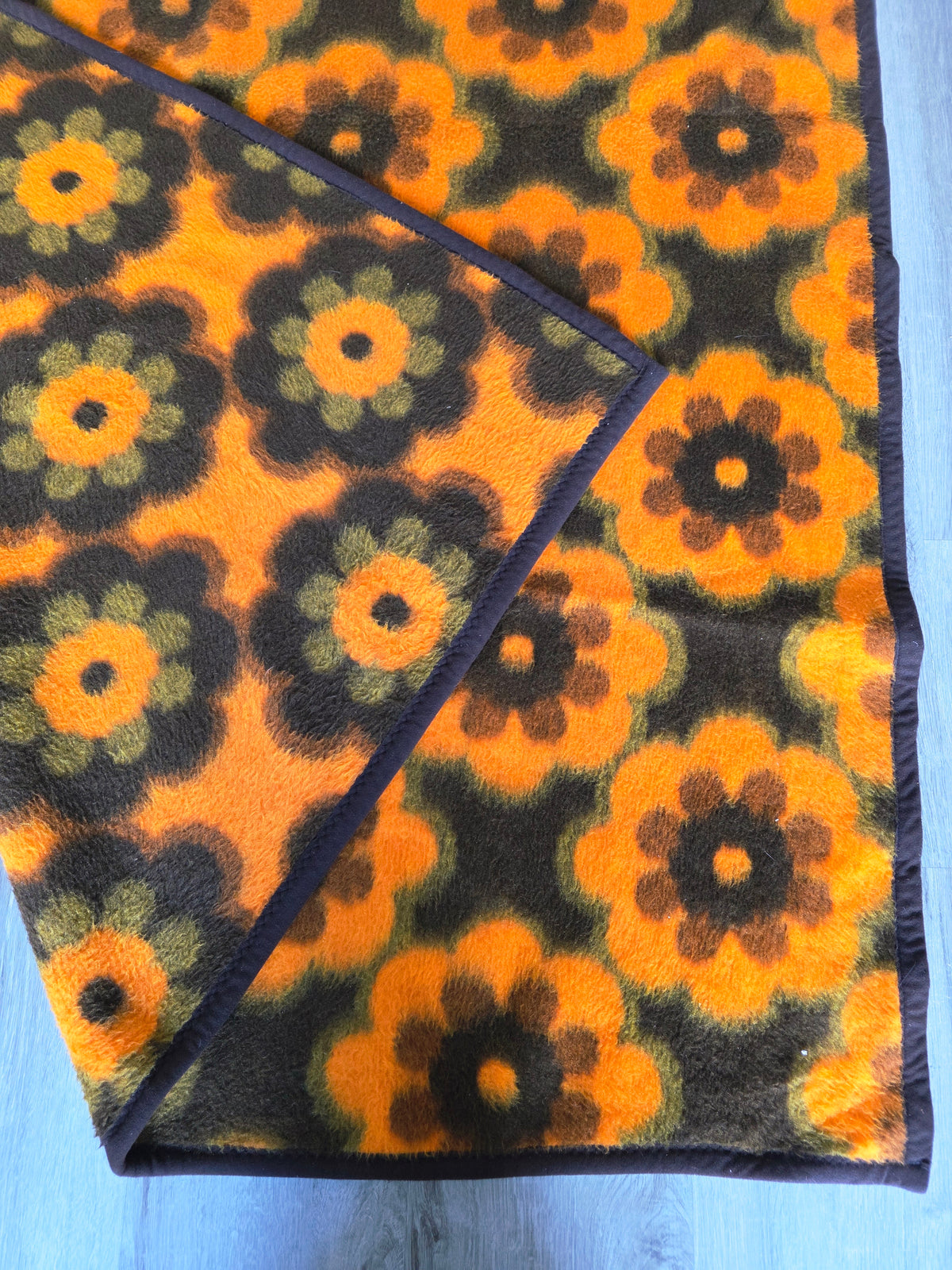 Didas deken oranje bruin groen bloemen