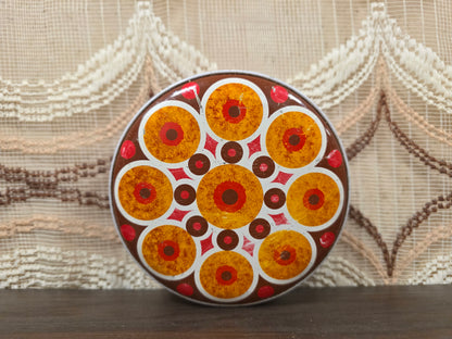 Vintage rond blik met cirkelpatroon