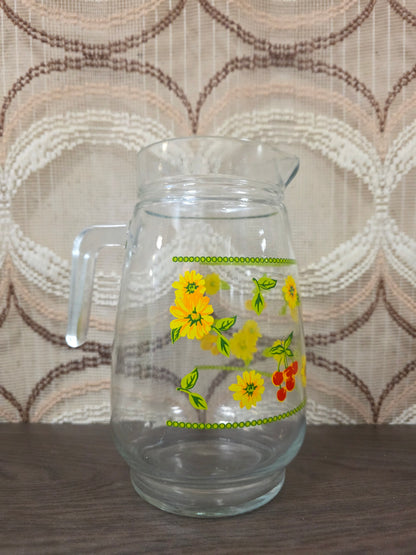 Vintage glazen karaf met gele bloemen