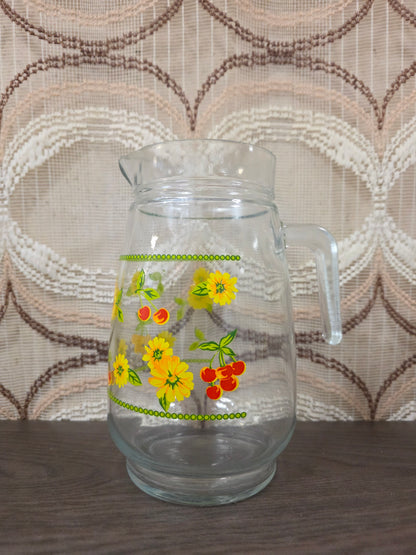Vintage glazen karaf met gele bloemen