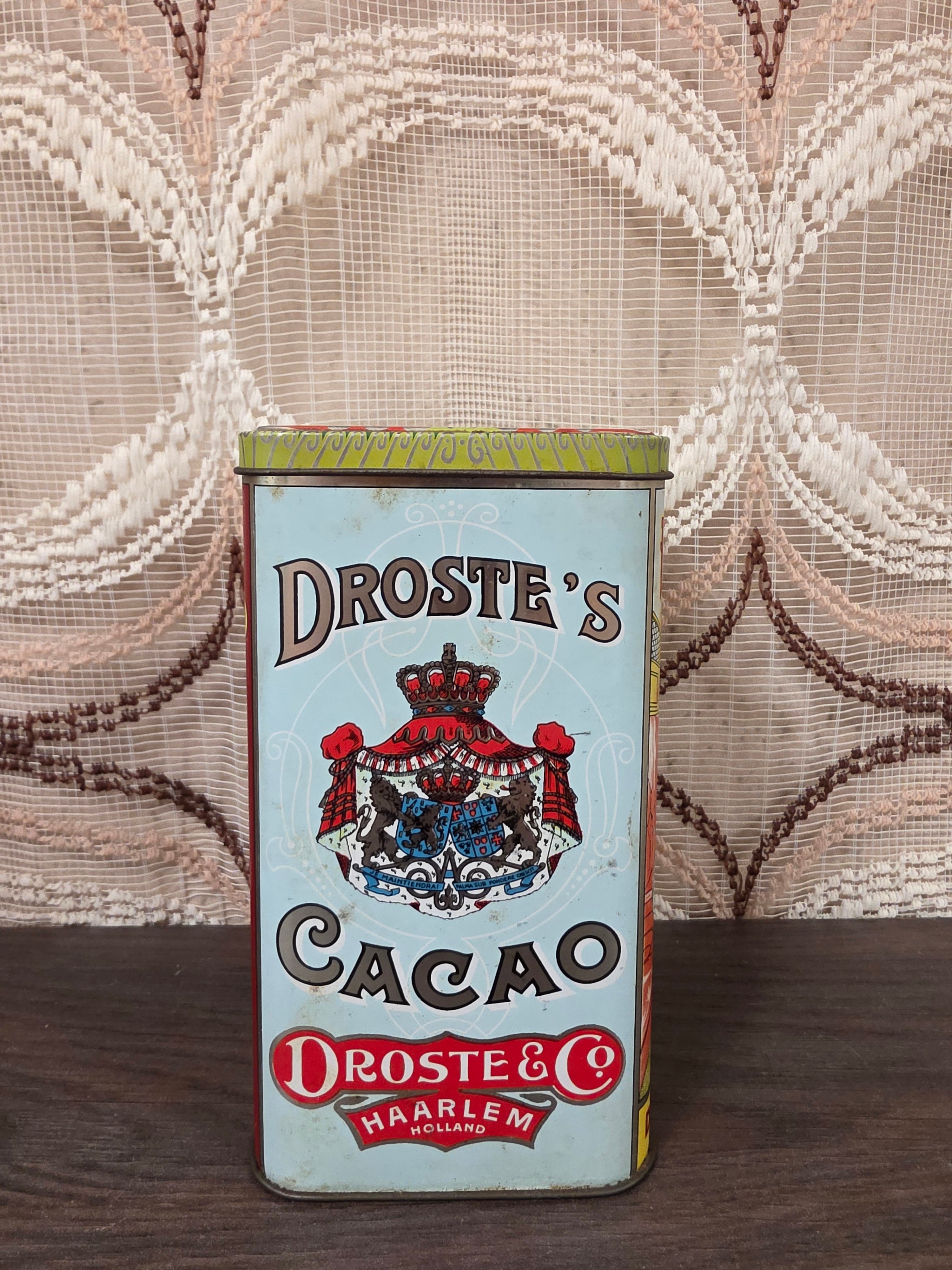 Vintage Droste cacao blik met klassieke reclameafbeeldingen