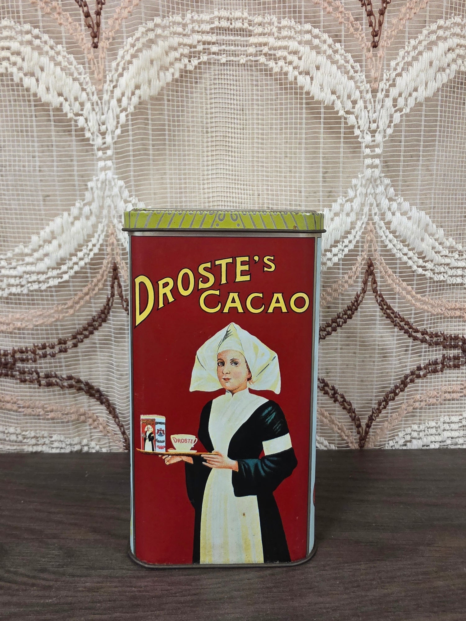 Vintage Droste cacao blik met klassieke reclameafbeeldingen