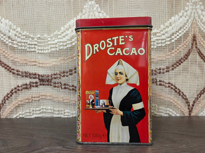 Vintage Droste cacao blik met vier verschillende afbeeldingen