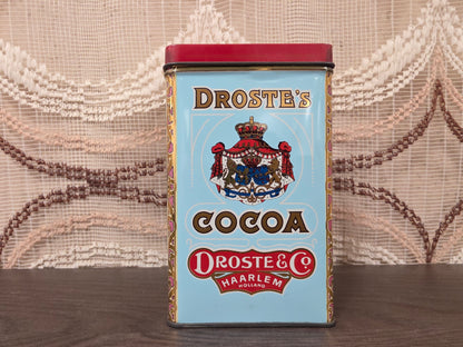 Vintage Droste cacao blik met vier verschillende afbeeldingen