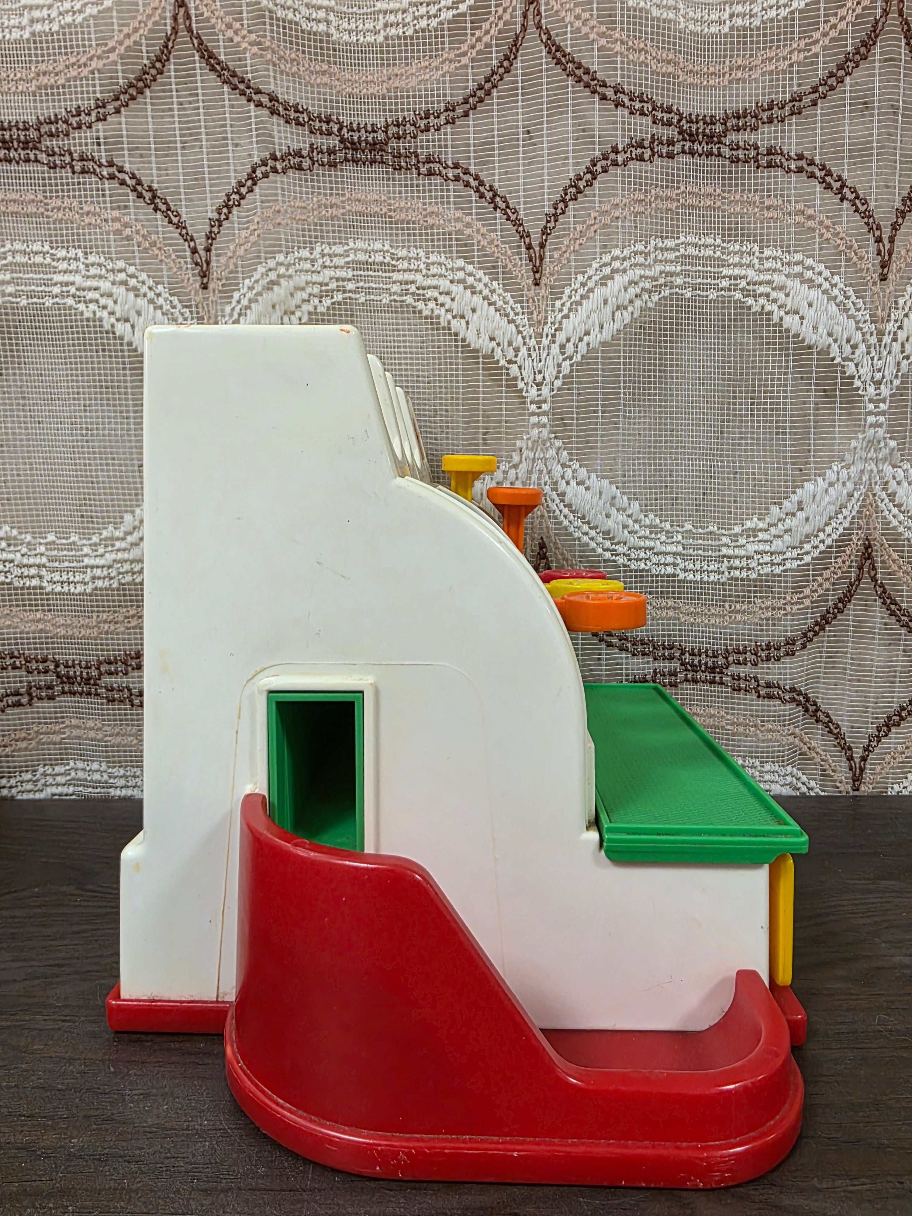 Fisher Price kassa  - compleet met gekleurde munten