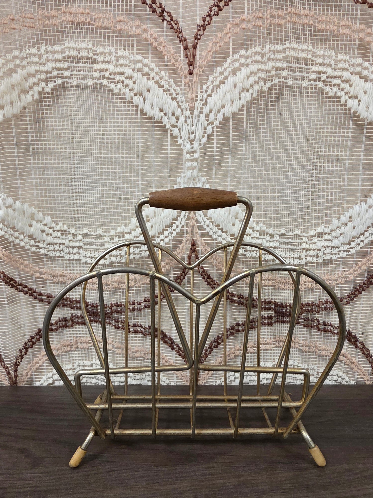 Vintage metalen servethouder met houten handgreep