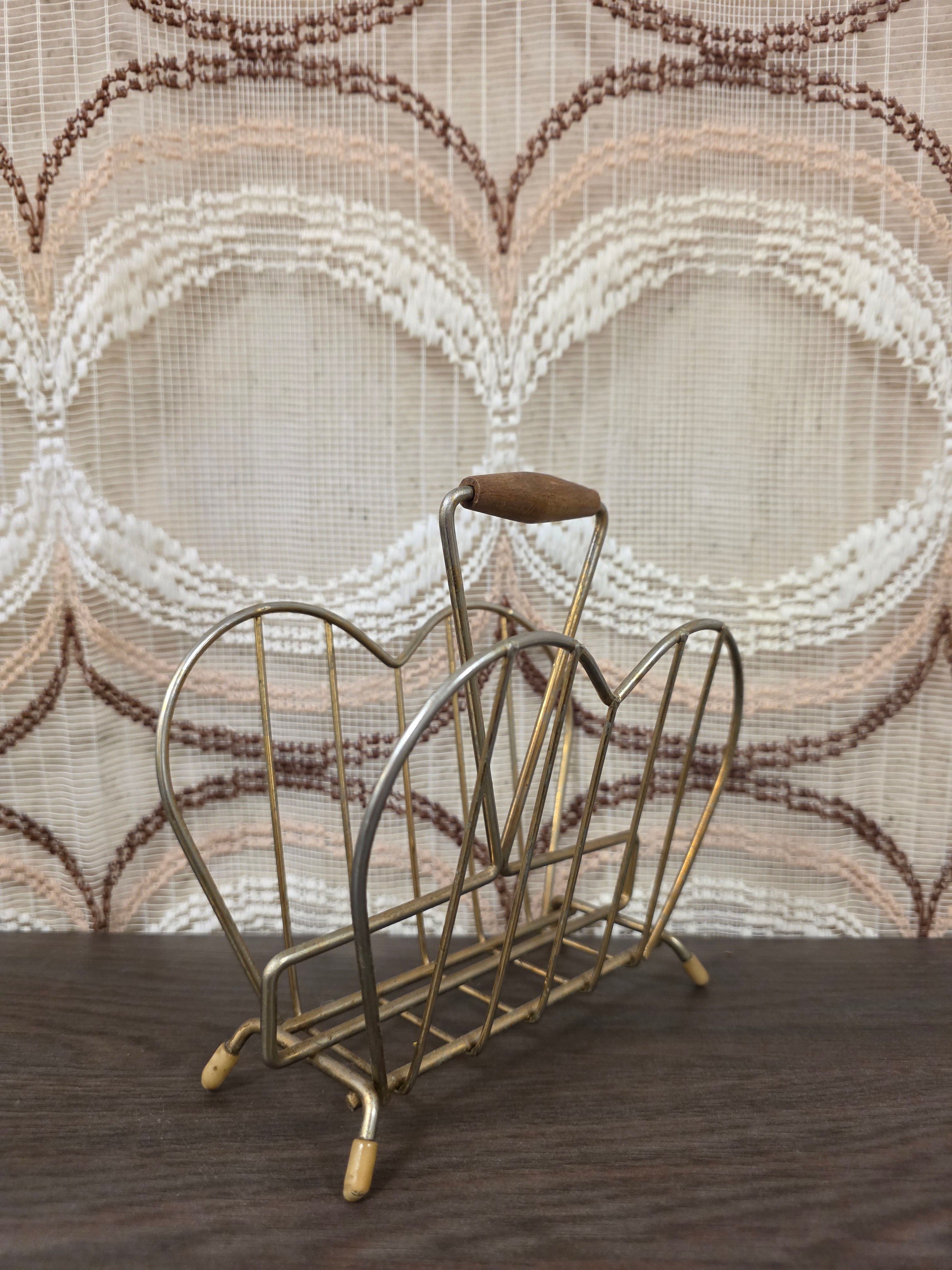 Vintage metalen servethouder met houten handgreep