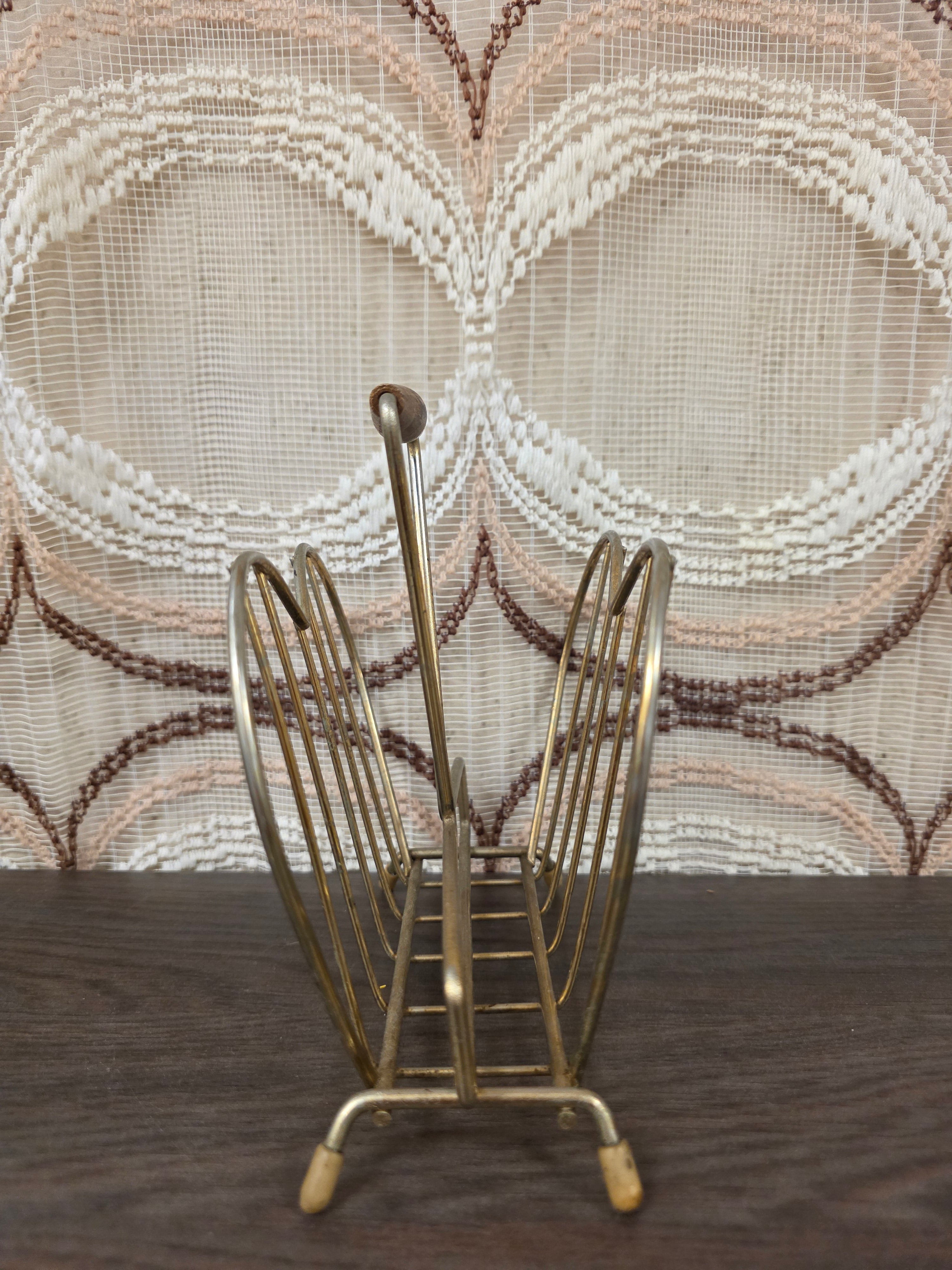 Vintage metalen servethouder met houten handgreep