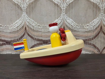 Ambi Toys Baby Boat E356 met geel poppetje