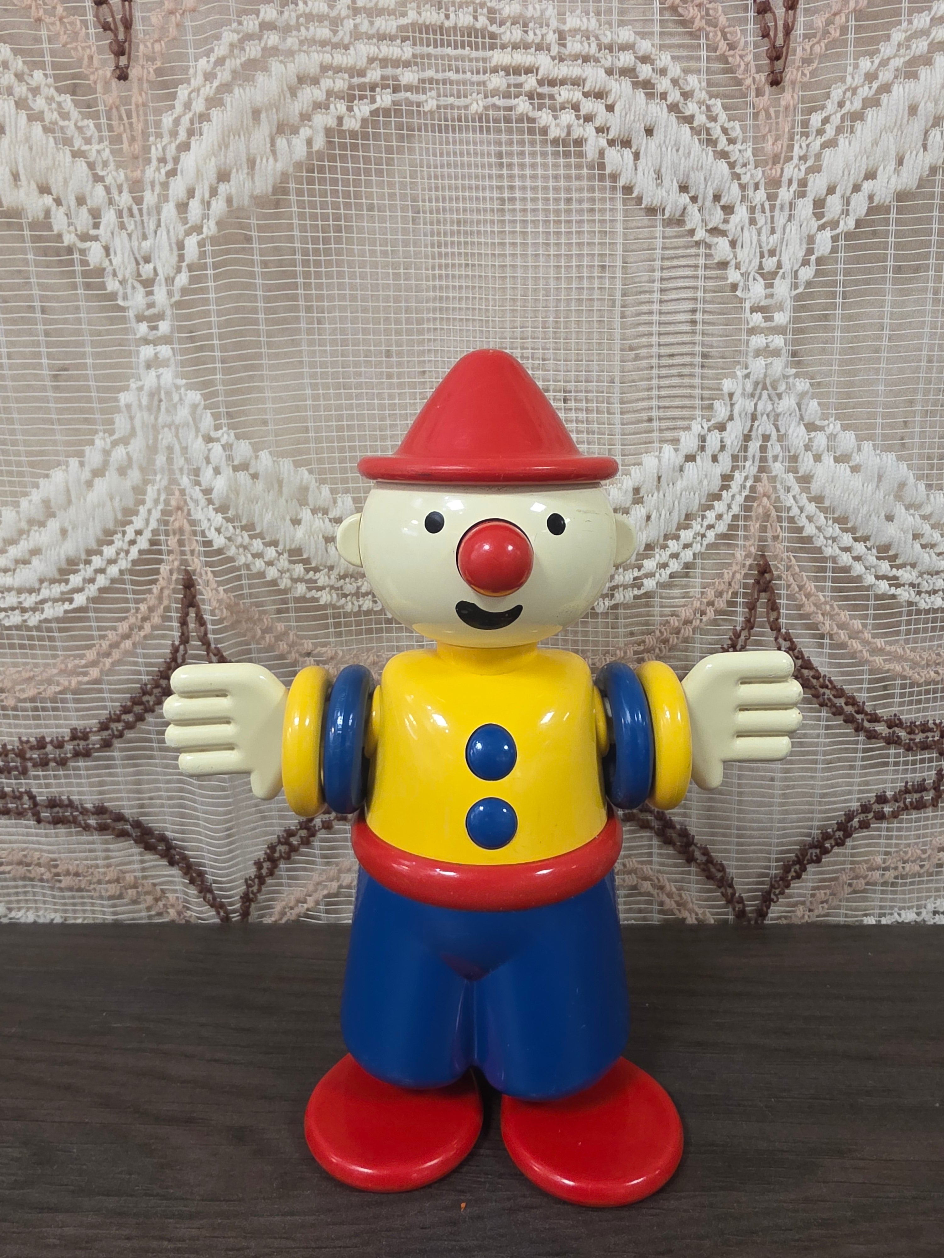 Ambi Toys Charlie clown geel blauw