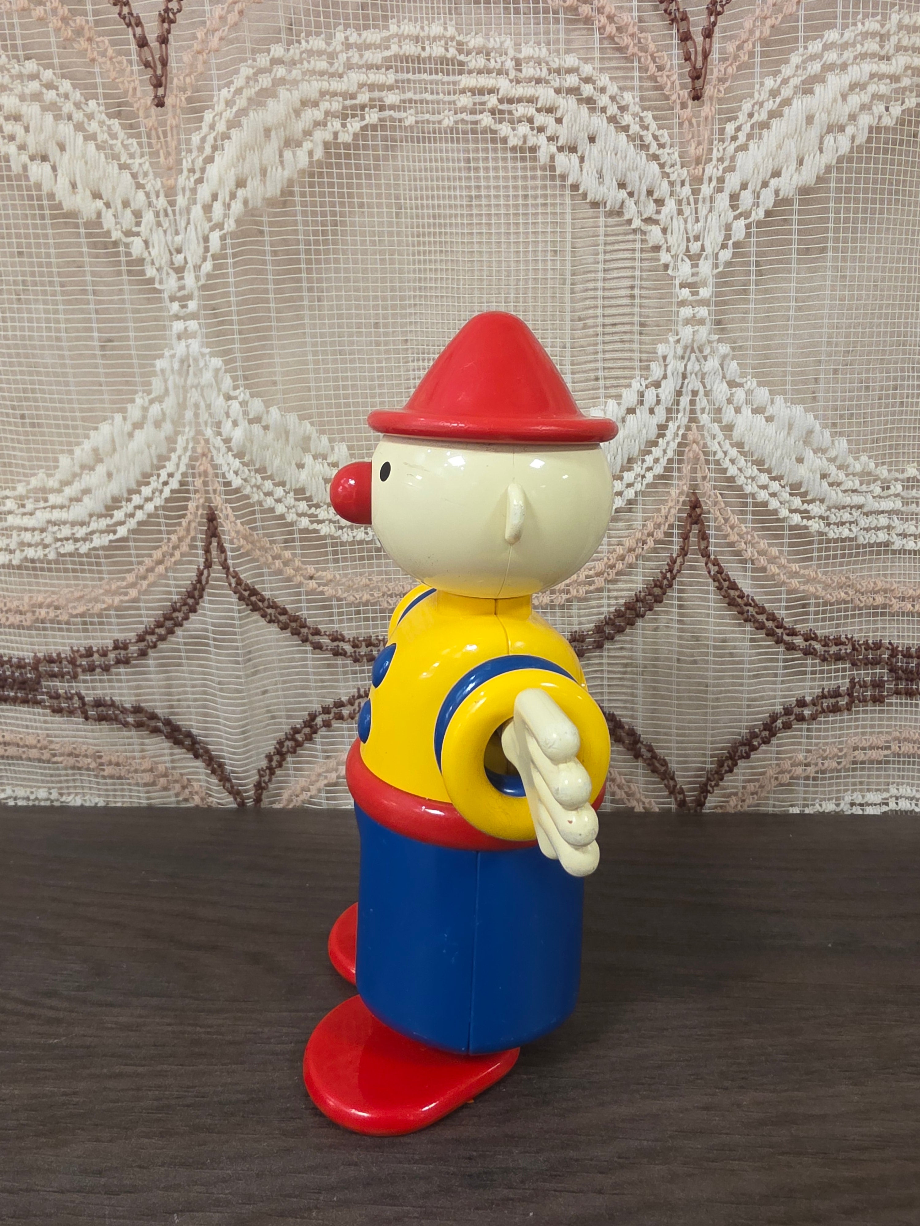 Ambi Toys Charlie clown geel blauw