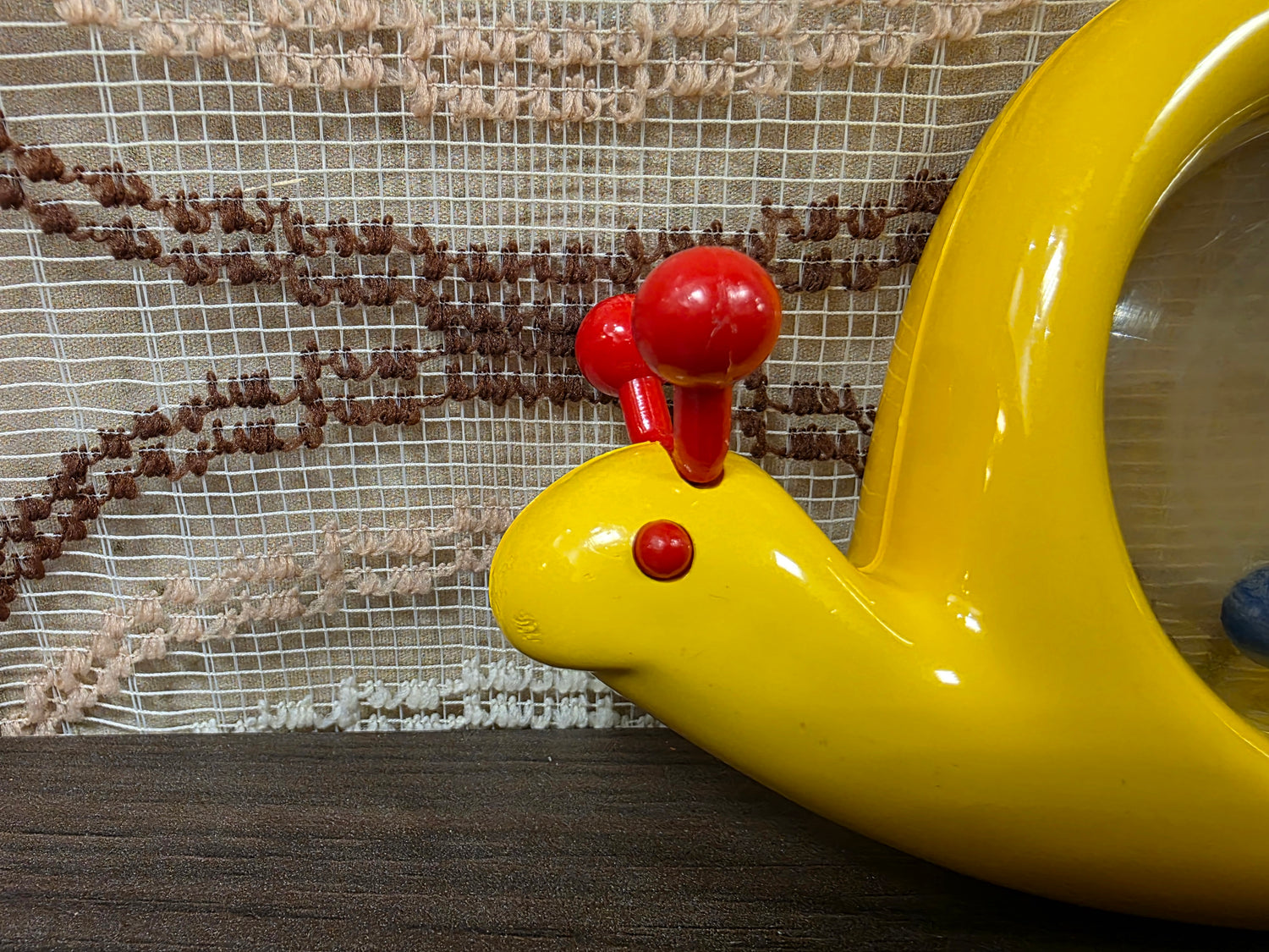 Ambi Toys Snail Rattle – gele slak