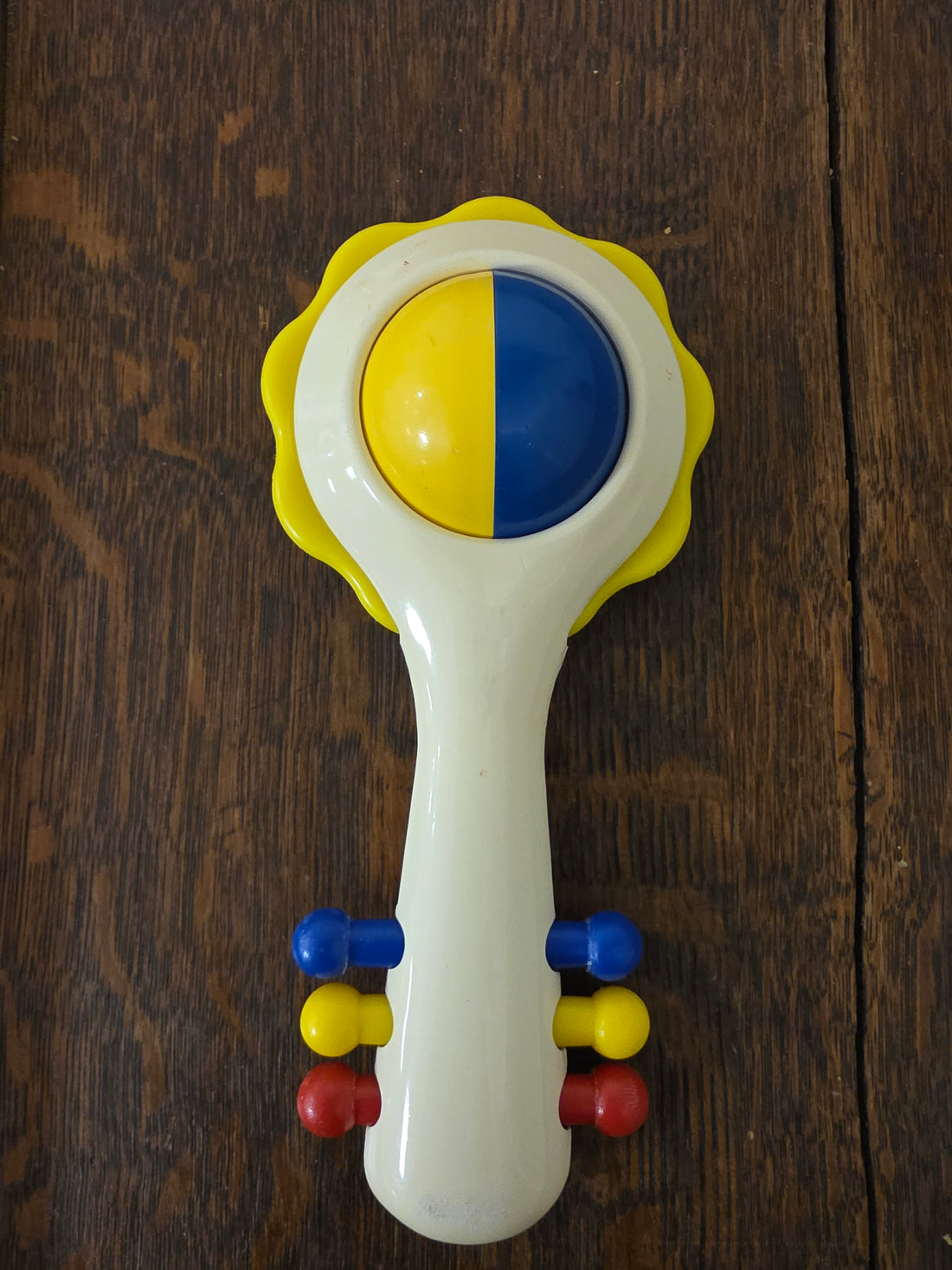 Ambi Toys Handy Dandy rammelaar gele rand