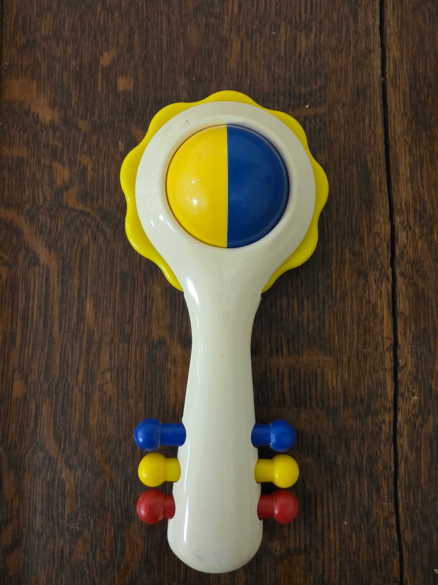 Ambi Toys Handy Dandy rammelaar gele rand