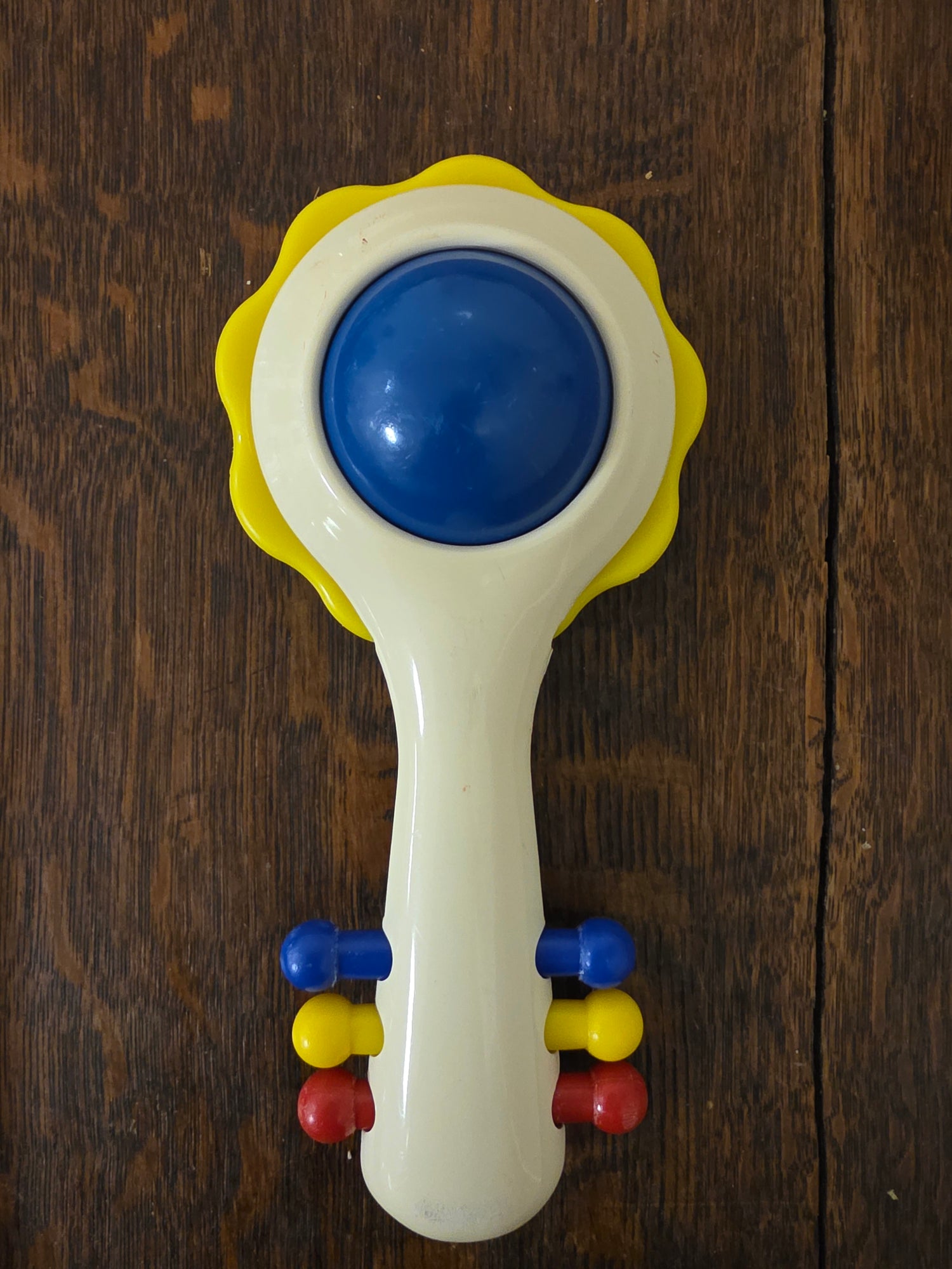 Ambi Toys Handy Dandy rammelaar gele rand