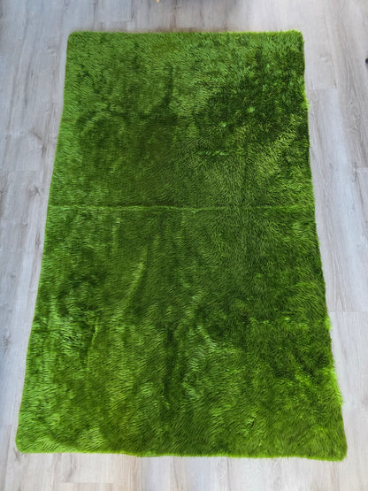 Vintage groene pluizige sprei