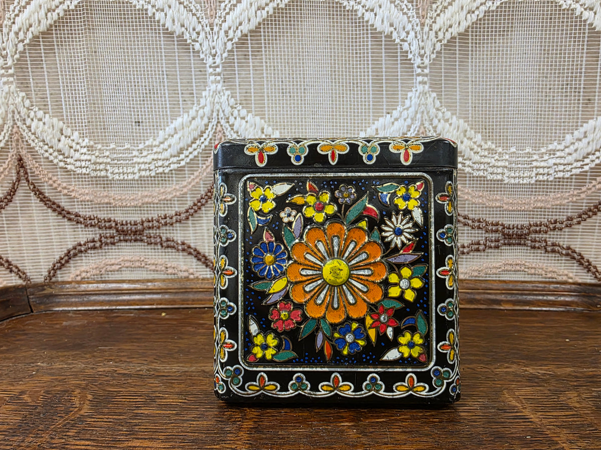 Vintage zwart bloemenblik kleurrijk decor