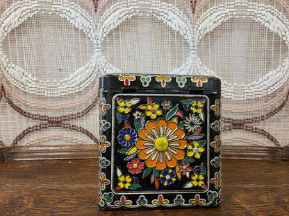 Vintage zwart bloemenblik kleurrijk decor